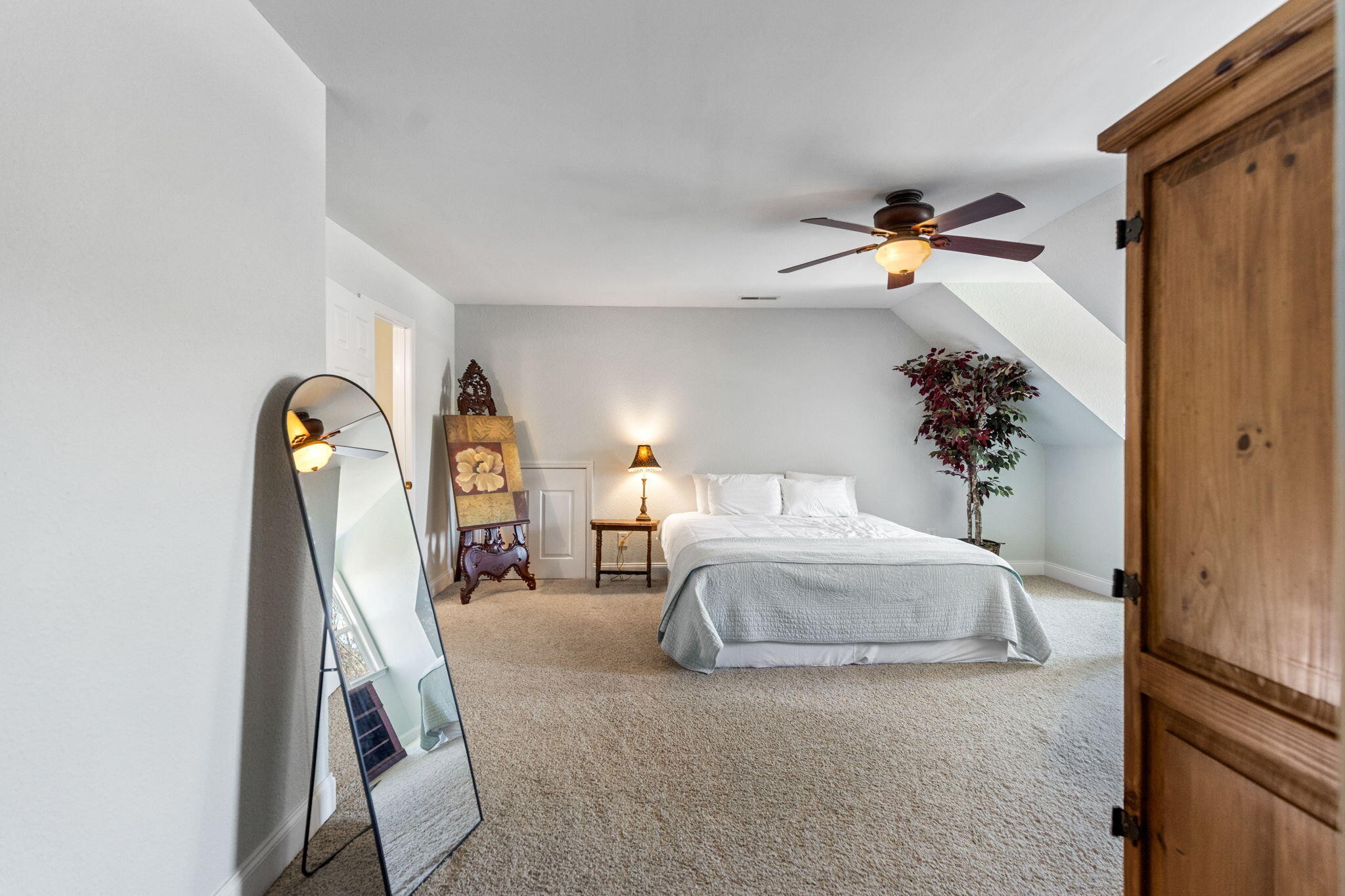 759 Pinhook Road Calhoun, TN 37309 - Photo 35 of 55 a bedroom with a bed and a potted plant