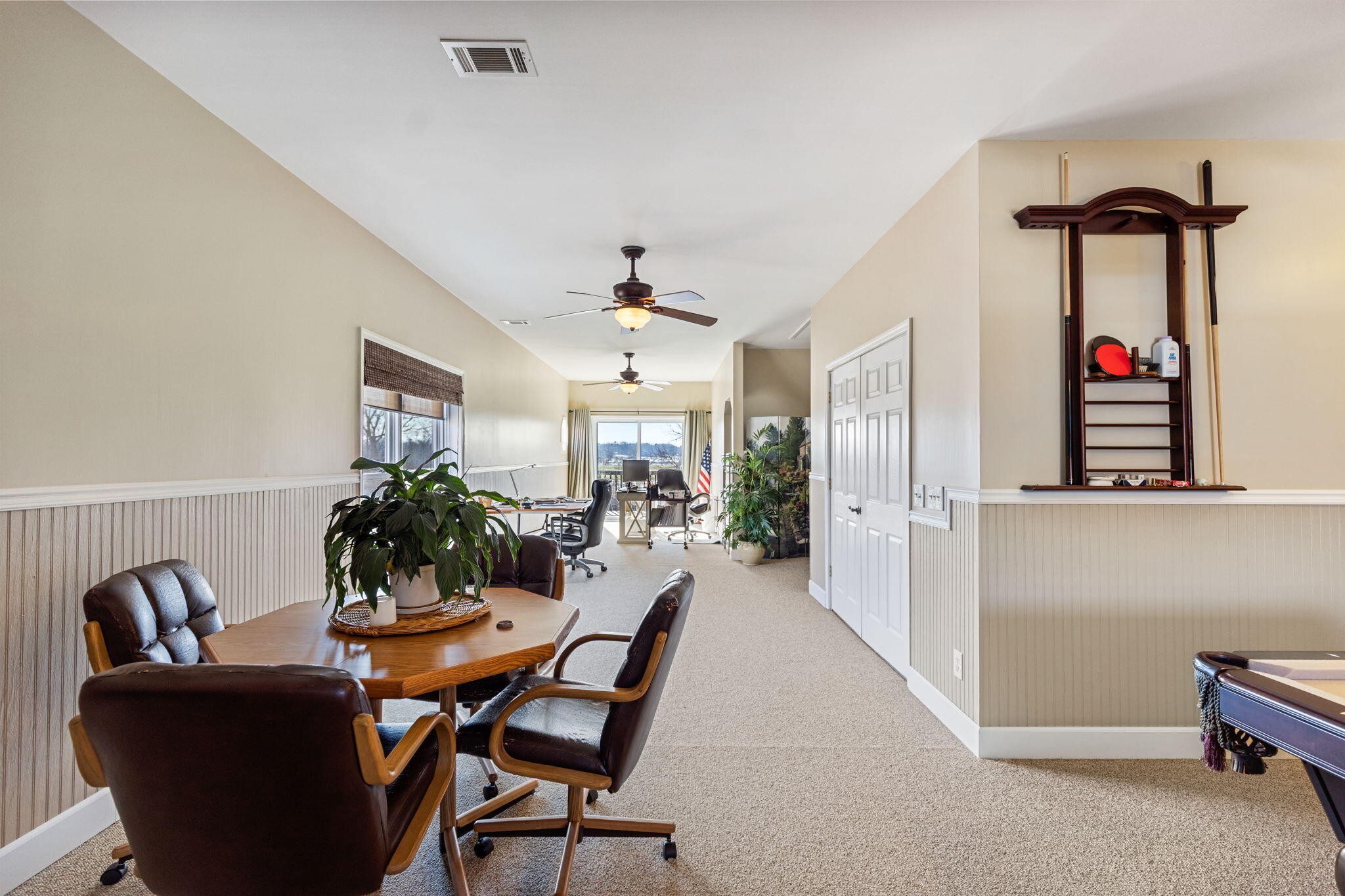 759 Pinhook Road Calhoun, TN 37309 - Photo 39 of 55 a view of a dining room with furniture and a potted plant
