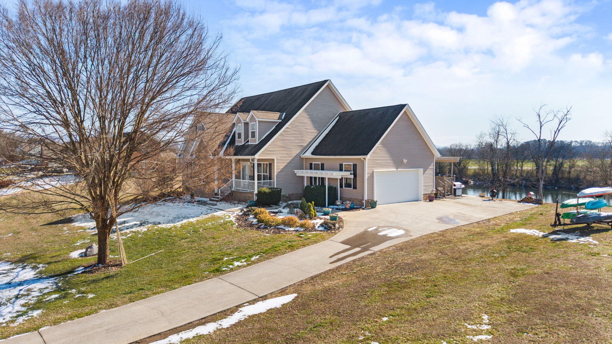 759 Pinhook Road Calhoun, TN 37309 - Photo 5 of 55 a front view of house with yard and trees in the background
