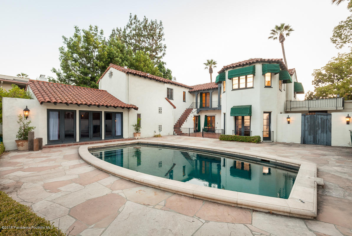 700 South Orange Grove Boulevard Pasadena, CA 91105 - Photo 13 of 50 a front view of a house with roof
