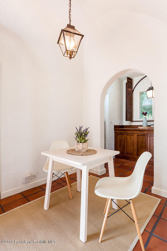 700 South Orange Grove Boulevard Pasadena, CA 91105 - Photo 22 of 50 a view of a dining room with furniture