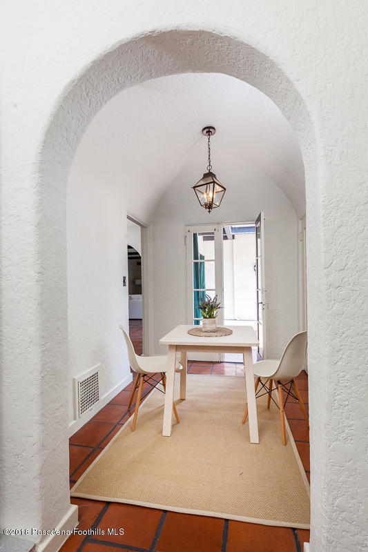 700 South Orange Grove Boulevard Pasadena, CA 91105 - Photo 23 of 50 a living room with furniture