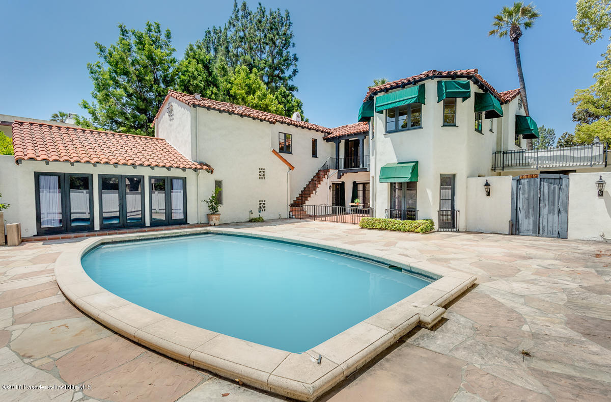 700 South Orange Grove Boulevard Pasadena, CA 91105 - Photo 33 of 50 a view of house with swimming pool