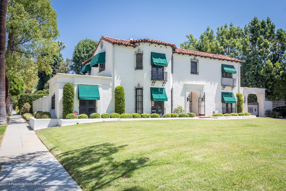 700 South Orange Grove Boulevard Pasadena, CA 91105 - Photo 44 of 50 front view of a house with a yard