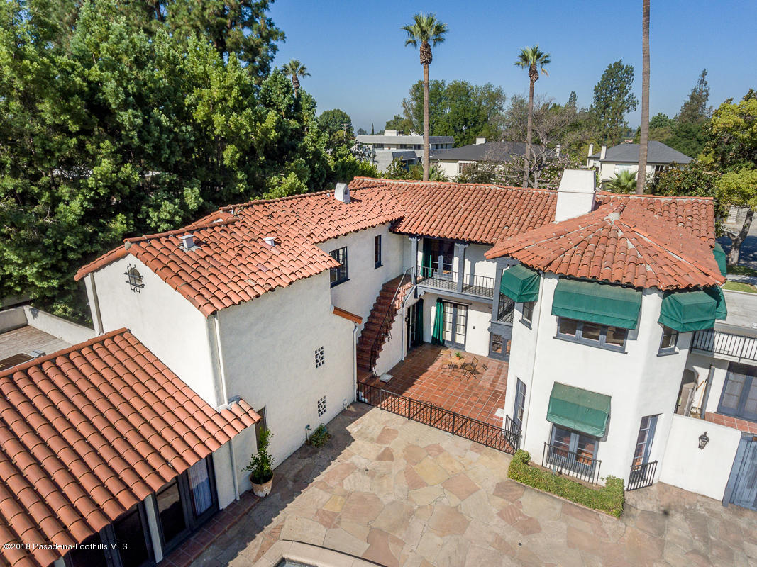 700 South Orange Grove Boulevard Pasadena, CA 91105 - Photo 45 of 50 a view of a house with a yard porch and sitting area