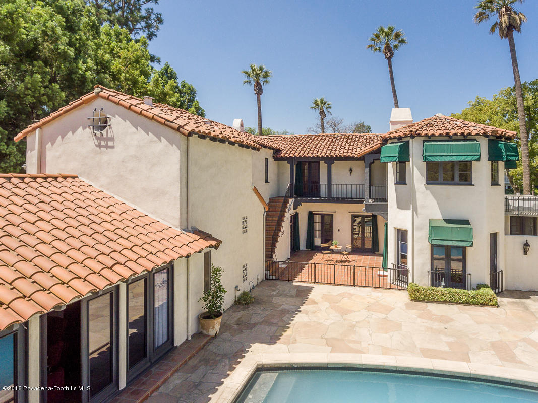 700 South Orange Grove Boulevard Pasadena, CA 91105 - Photo 47 of 50 a front view of a house with a yard