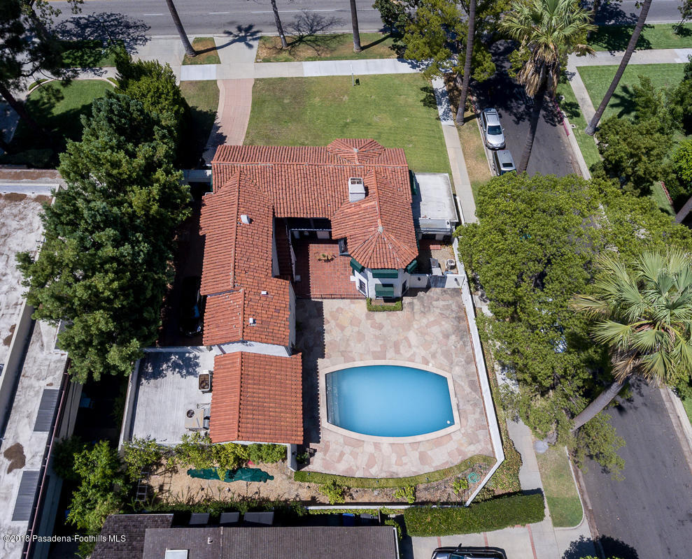 700 South Orange Grove Boulevard Pasadena, CA 91105 - Photo 49 of 50 an aerial view of a house with garden space and street view