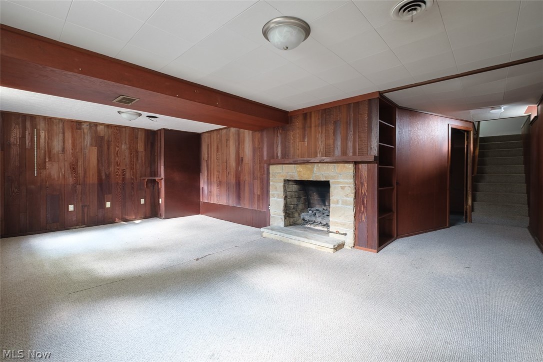 32165 Bainbridge Road Solon, OH 44139 - Photo 22 of 33 Large rec room with woodburning fireplace