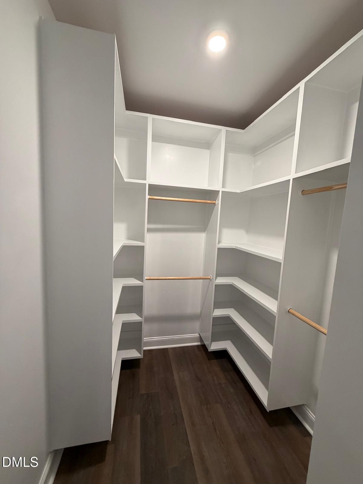 98 Stone Bridge Crossing Chapel Hill, NC 27517 - Photo 14 of 37 a view of walk in closet with empty racks