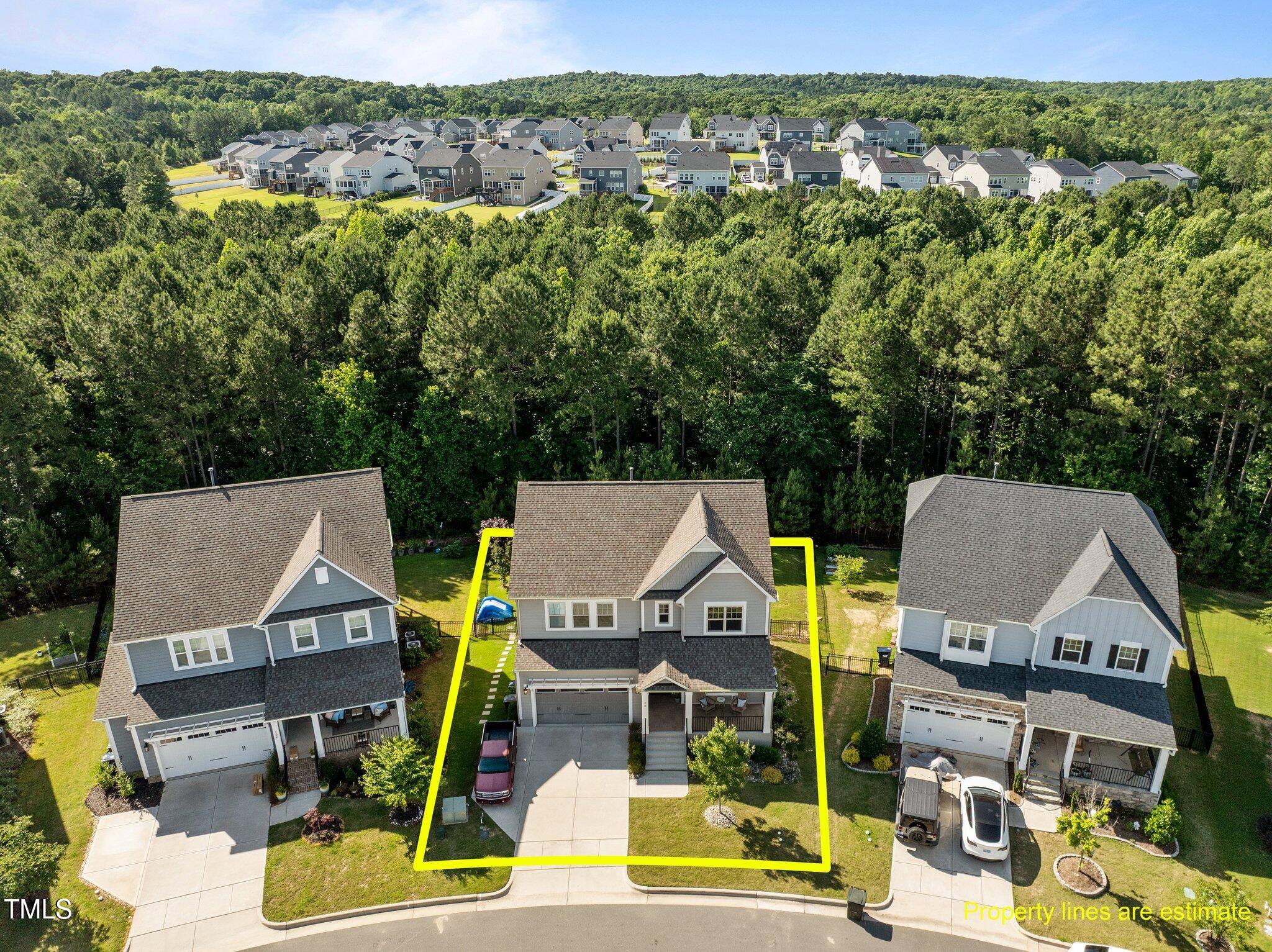 98 Stone Bridge Crossing Chapel Hill, NC 27517 - Photo 29 of 37 an aerial view of a houses with yard