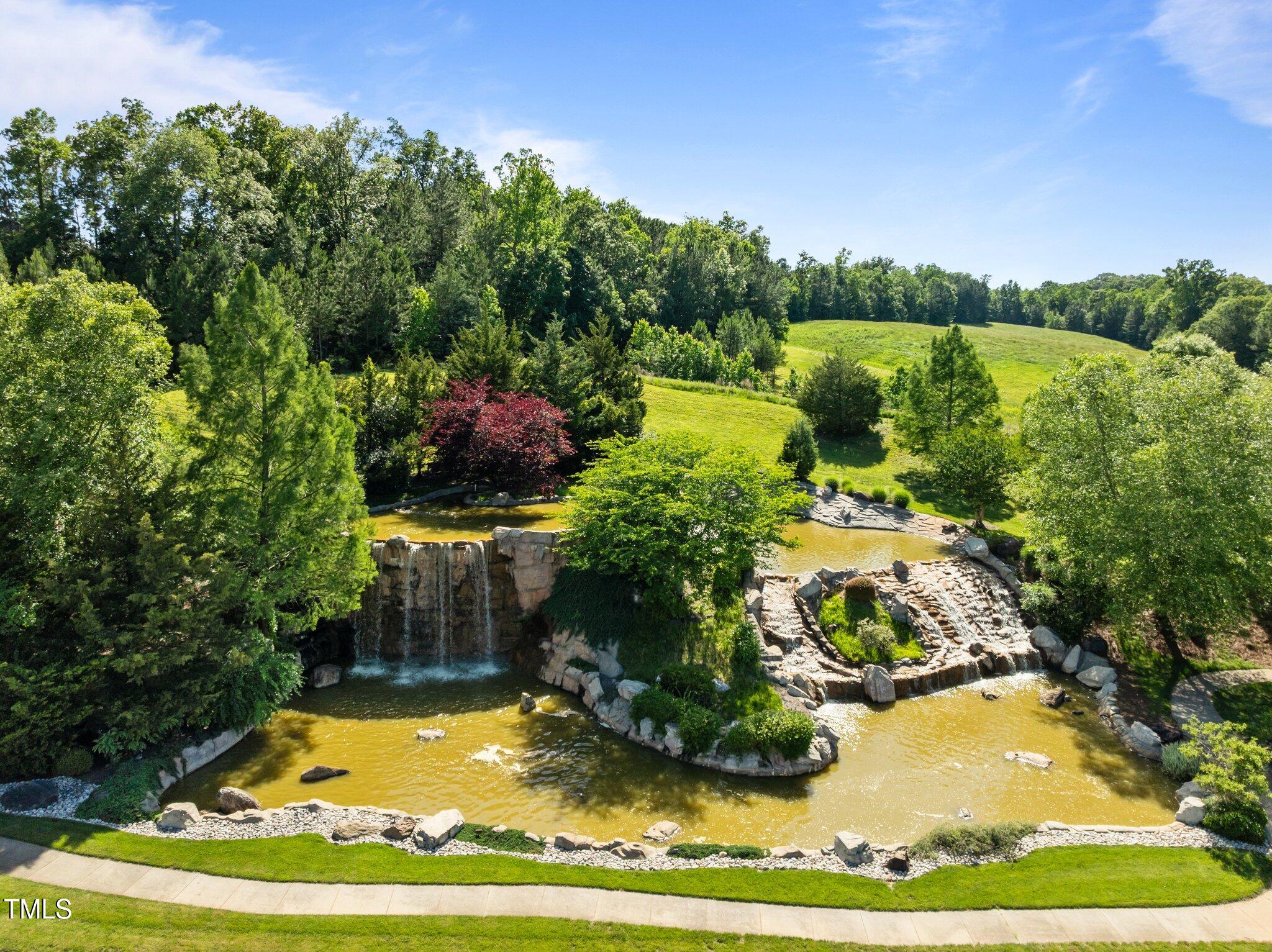 98 Stone Bridge Crossing Chapel Hill, NC 27517 - Photo 31 of 37 a view of a garden