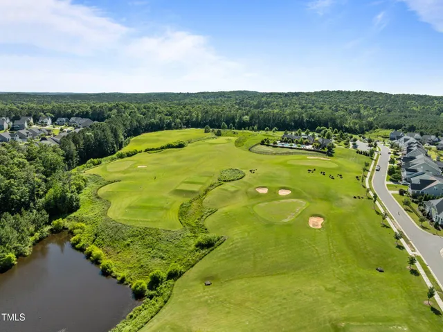a view of a swimming pool with a garden