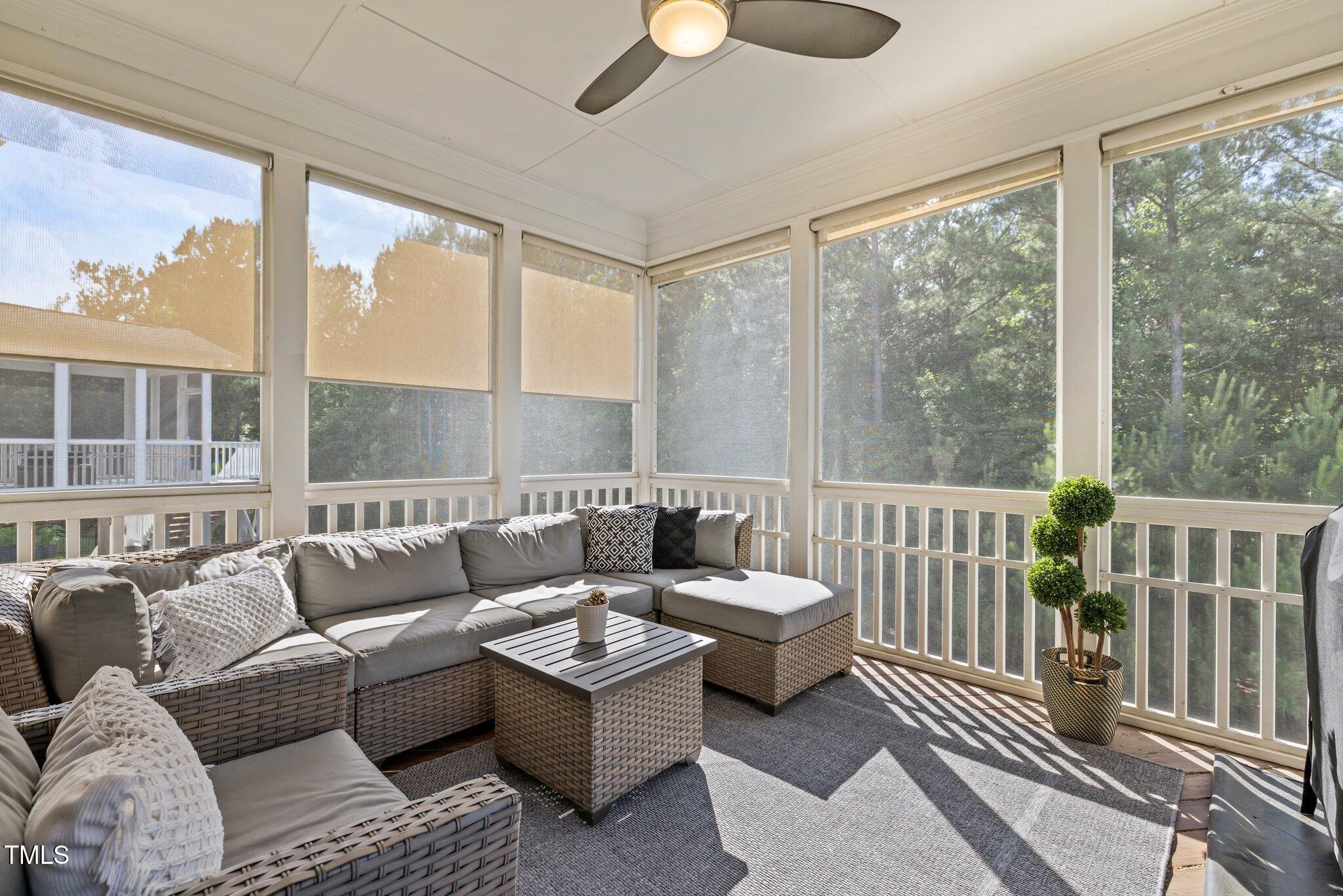 98 Stone Bridge Crossing Chapel Hill, NC 27517 - Photo 7 of 37 a living room with furniture and a large window