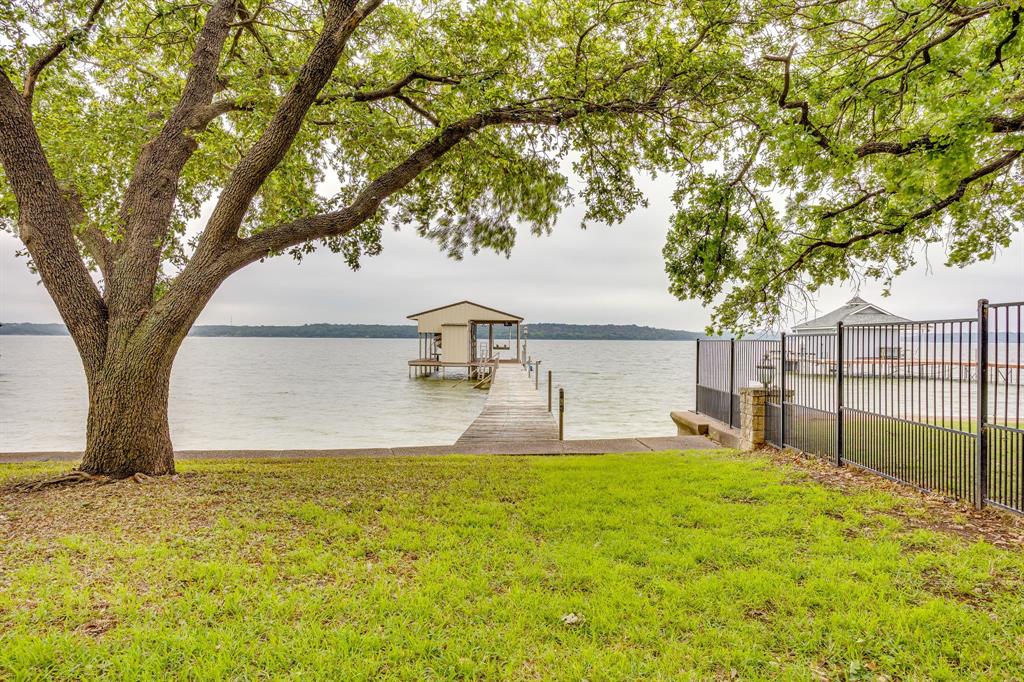 10814 Power Squadron Road Azle, TX 76020 - Photo 21 of 34 a house view with swimming pool in front of it
