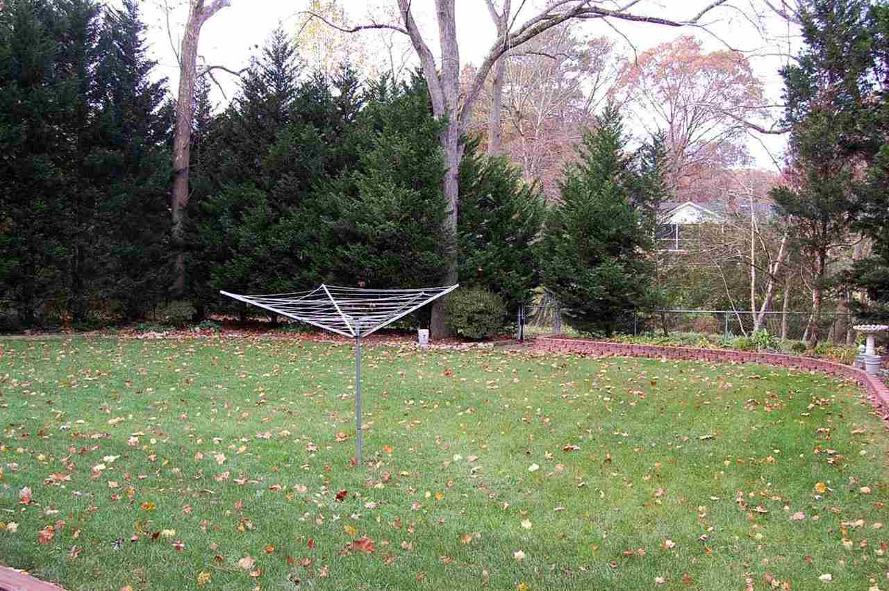800 Purdue Street Raleigh, NC 27609 - Photo 19 of 21 a backyard of a house with entertaining space