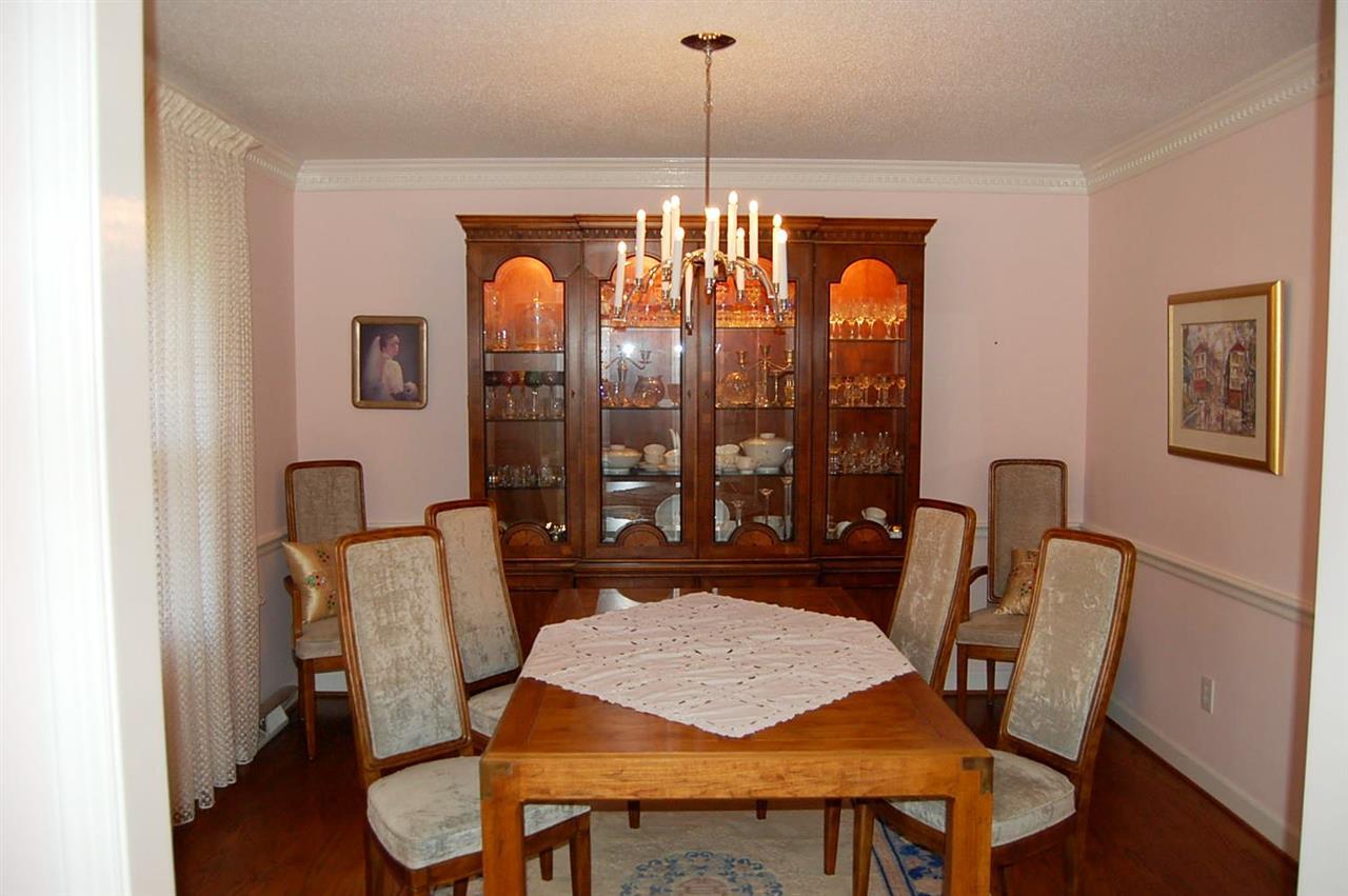 800 Purdue Street Raleigh, NC 27609 - Photo 5 of 21 a view of a dining room with furniture window and wooden floor