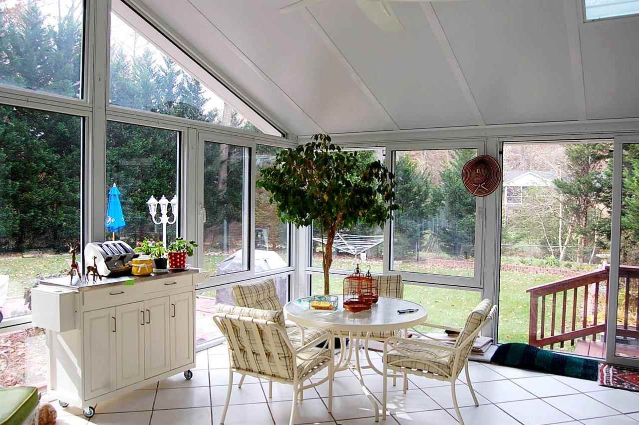 800 Purdue Street Raleigh, NC 27609 - Photo 10 of 21 a view of an outdoor dining space with a table and chairs