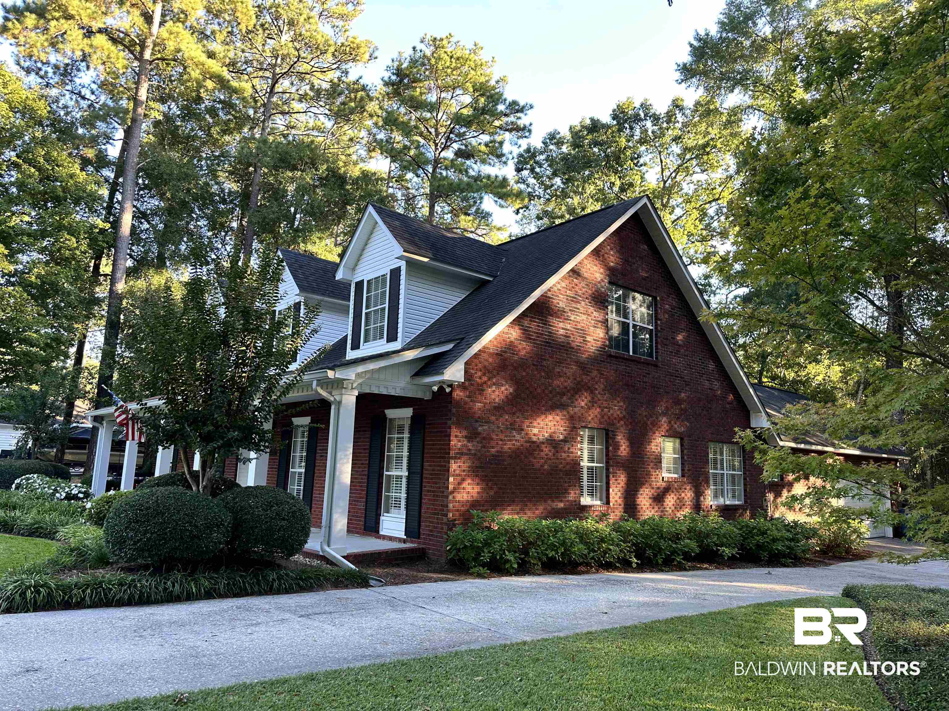 148 Brooks Boulevard Brewton, AL 36426 - Photo 45 of 45 View of front facade featuring brick siding and a front lawn
