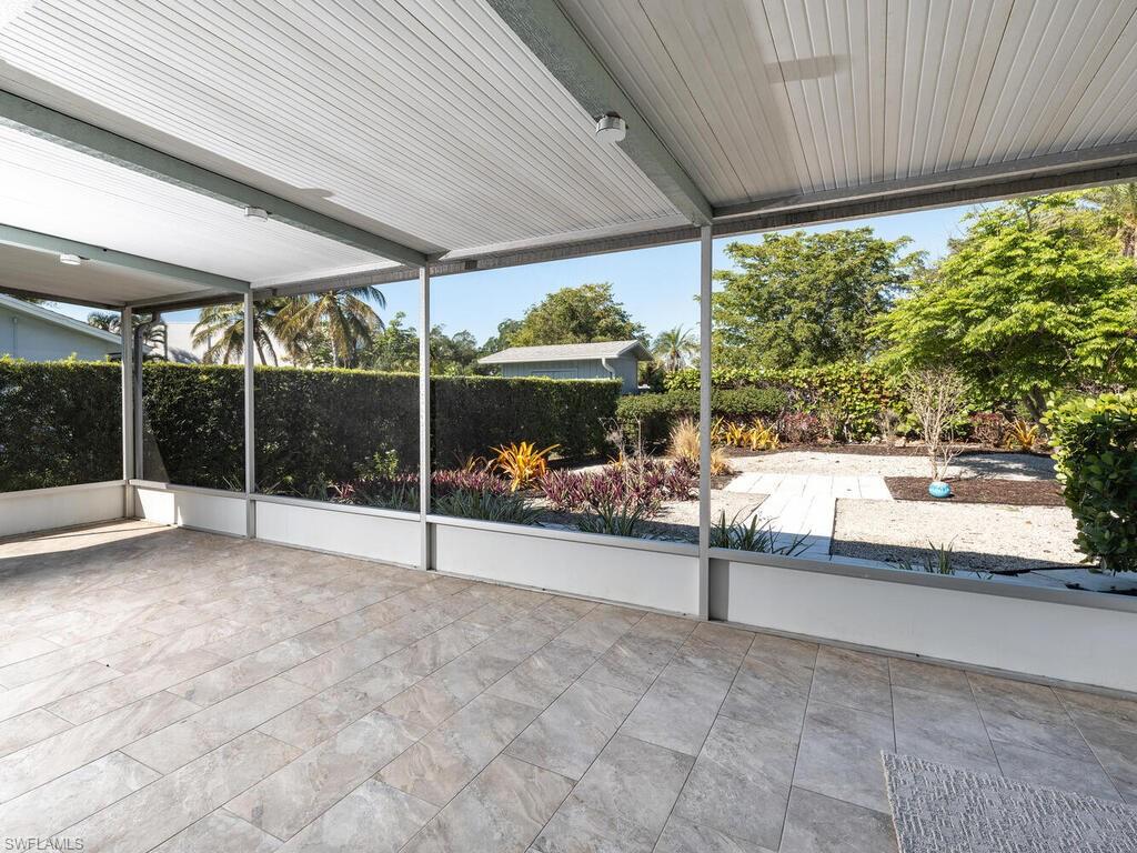 1036 Lake Shore Court Naples, FL 34103 - Photo 13 of 15 View of unfurnished sunroom