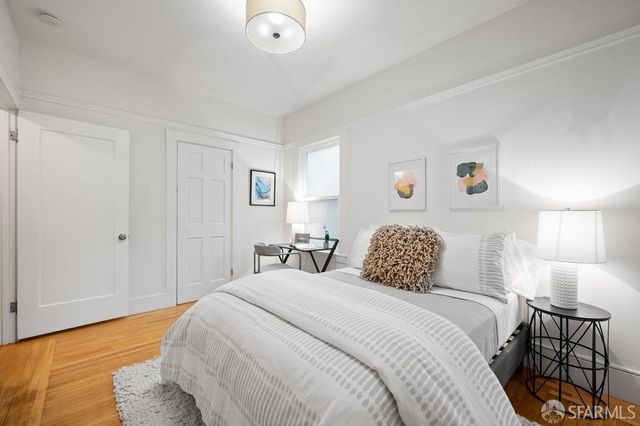 a view of a house with a yard and plants