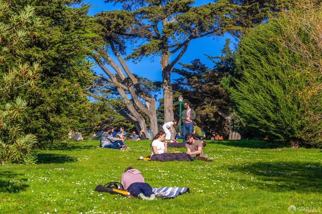 a view of a room with furniture and window