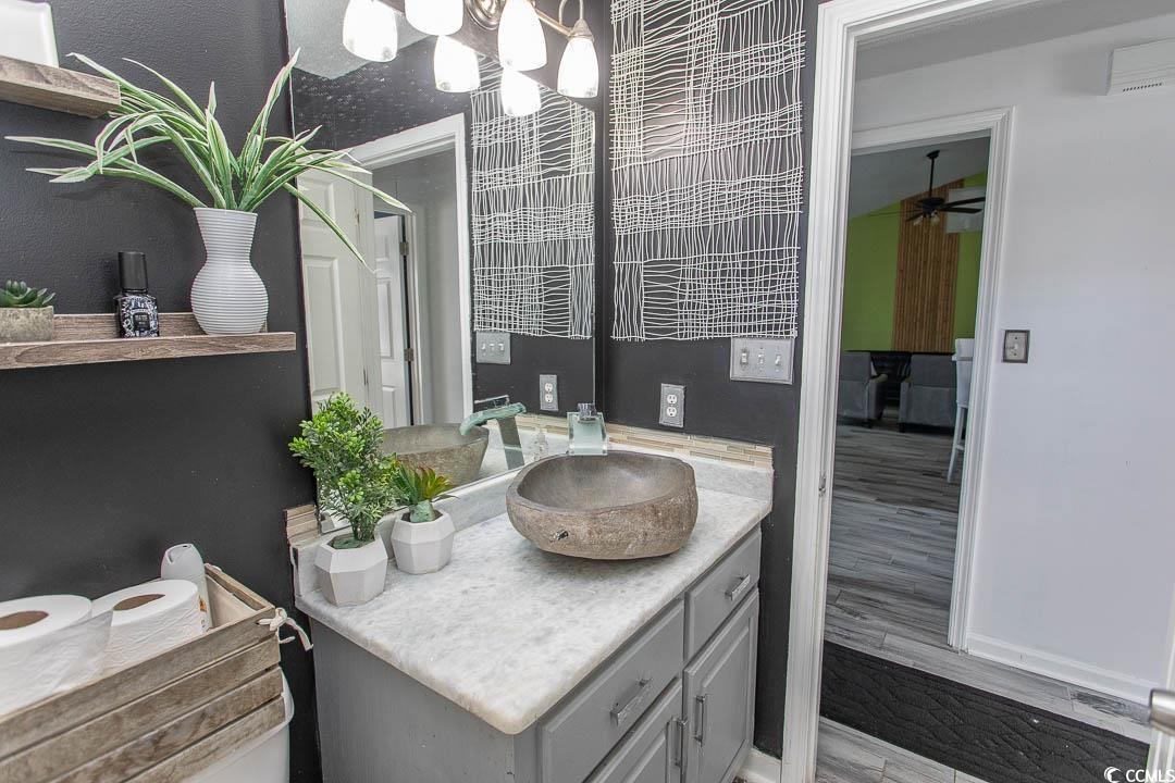 761 Drawbridge Drive Conway, SC 29526 - Photo 19 of 36 Half bathroom featuring vanity