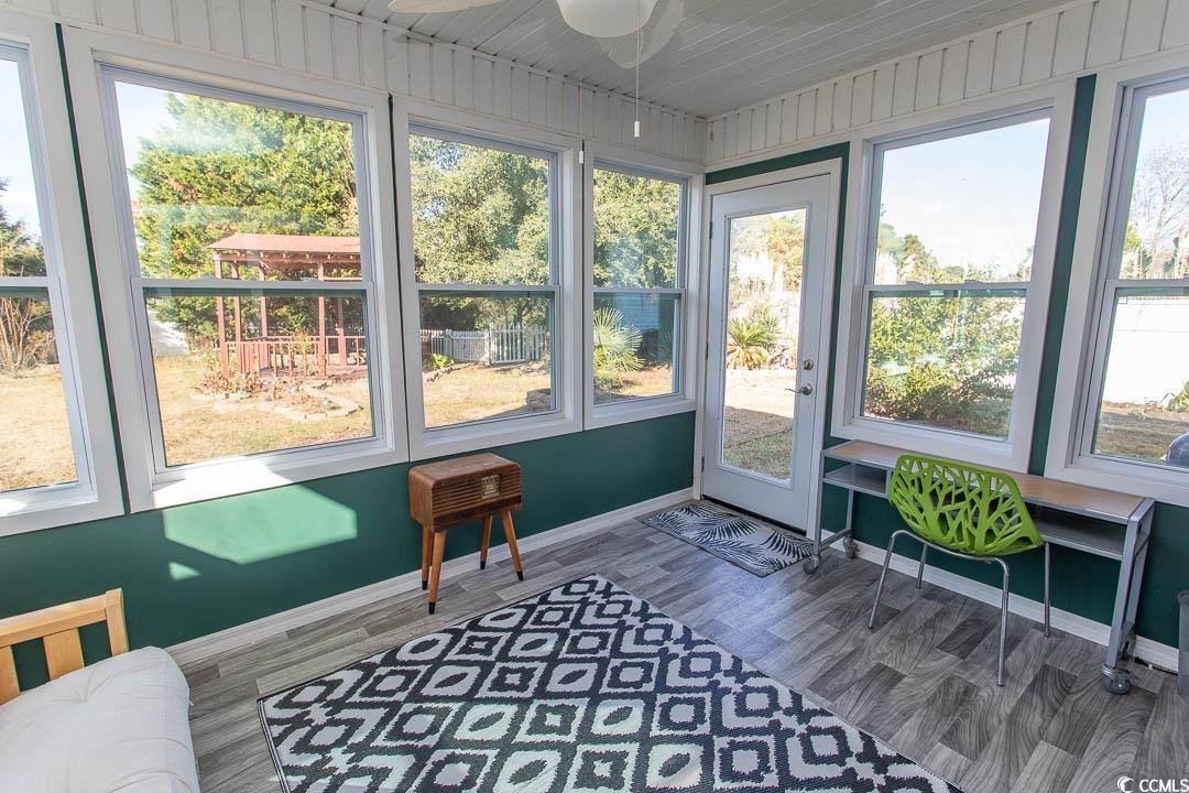 761 Drawbridge Drive Conway, SC 29526 - Photo 22 of 36 Sunroom / solarium with wood finished floors and healthy amount of natural light