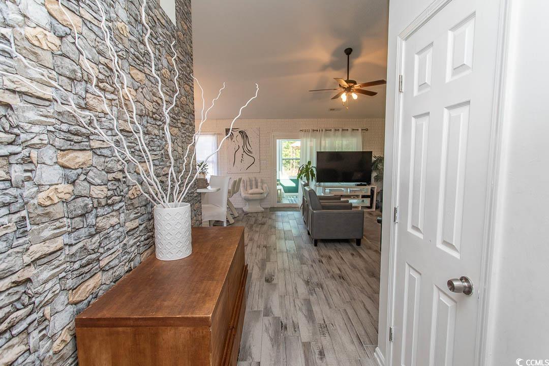 761 Drawbridge Drive Conway, SC 29526 - Photo 3 of 36 Living area with light wood-style floors and a ceiling fan