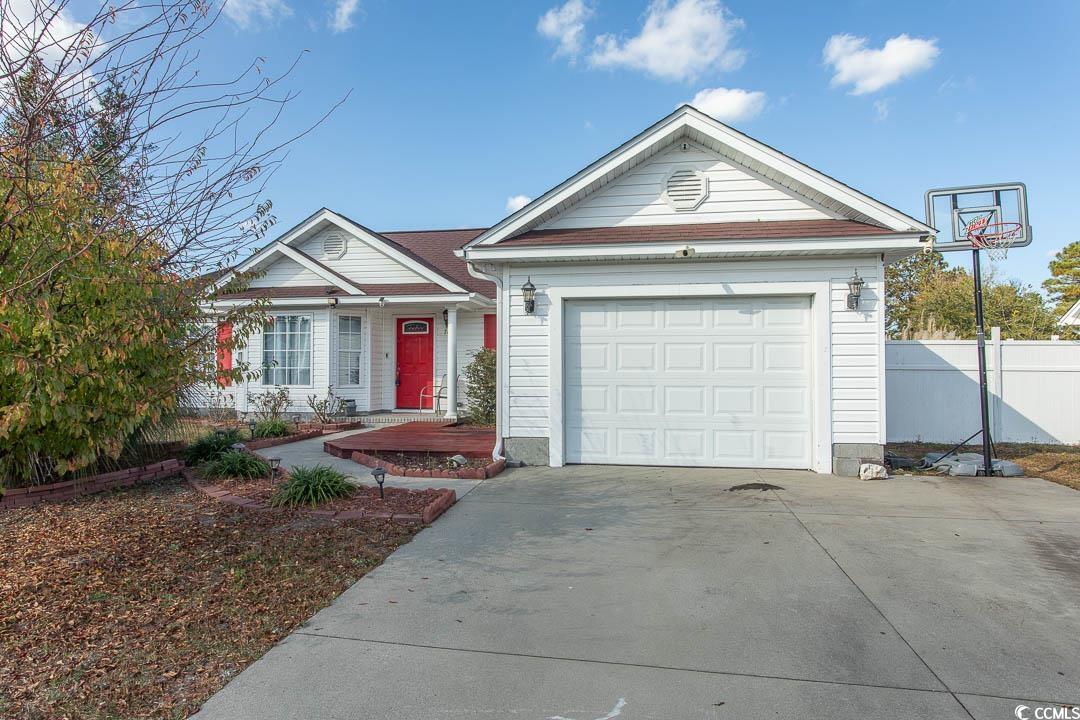 761 Drawbridge Drive Conway, SC 29526 - Photo 34 of 36 View of front facade with concrete driveway and a garage
