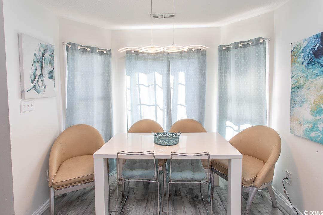 761 Drawbridge Drive Conway, SC 29526 - Photo 4 of 36 Dining area with wood finished floors