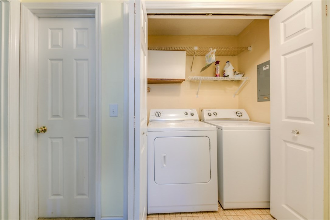 2743 Forest Ridge Drive, Unit I3 Fernandina Beach, FL 32034 - Photo 12 of 21 a utility room with dryer and washer