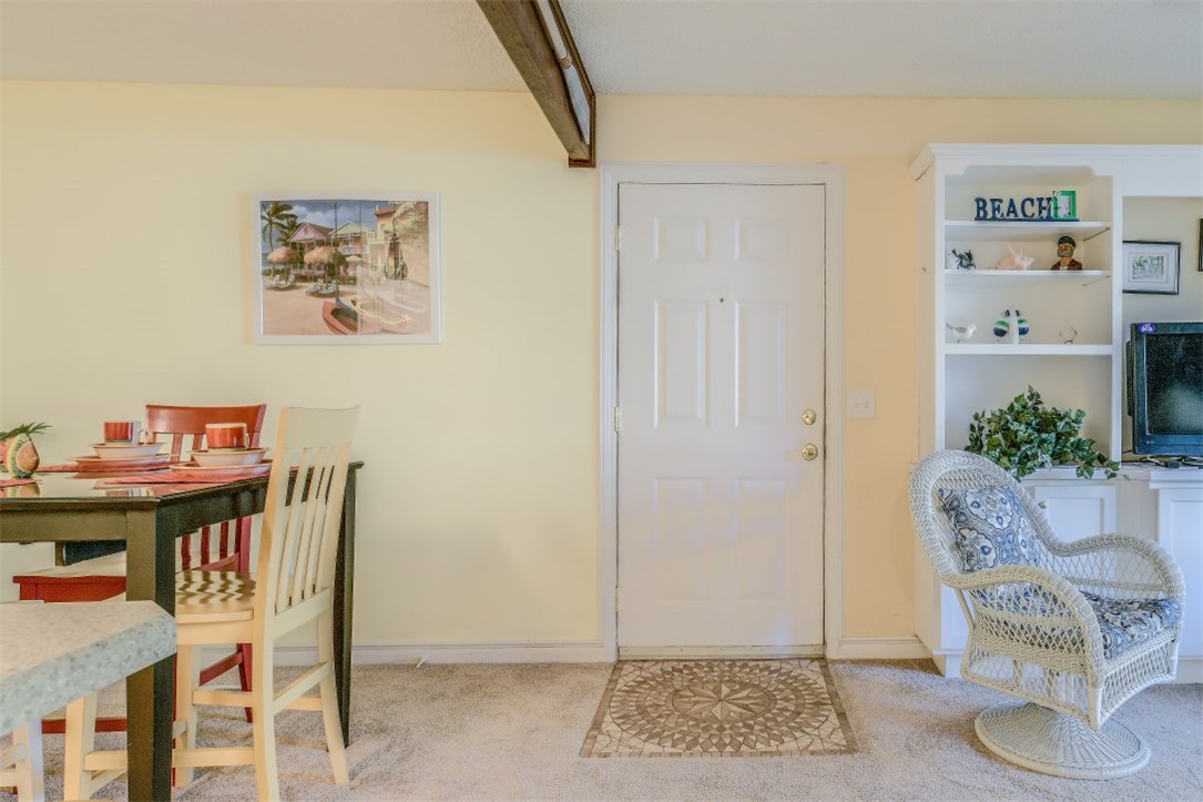 2743 Forest Ridge Drive, Unit I3 Fernandina Beach, FL 32034 - Photo 14 of 21 a view of a dining room with furniture and wooden floor