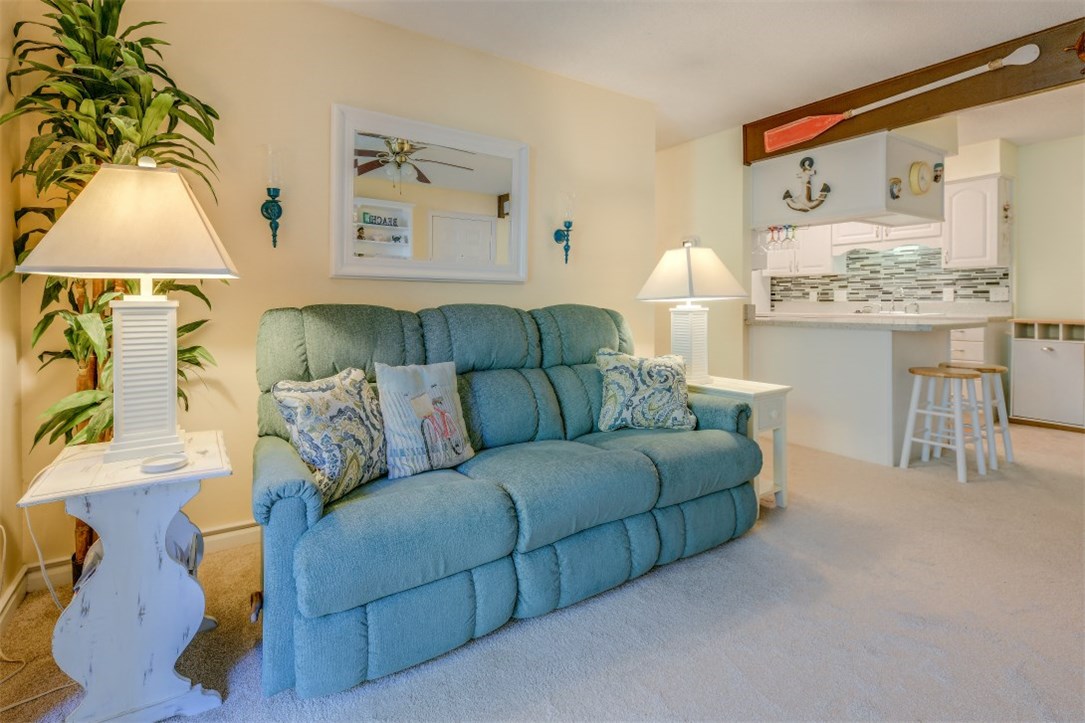 2743 Forest Ridge Drive, Unit I3 Fernandina Beach, FL 32034 - Photo 2 of 21 a living room with furniture and a painting