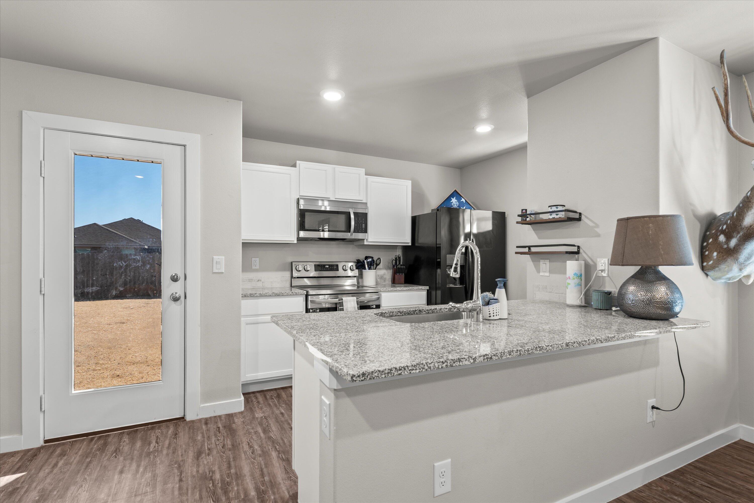 2015 134th Street Lubbock, TX 79423 - Photo 5 of 13 kitchen