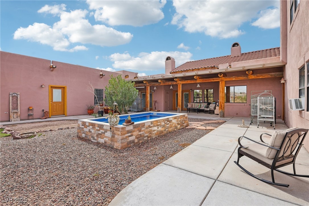 519 North Racetrack Road Henderson, NV 89015 - Photo 77 of 98 View of pool with a patio area and cooling unit