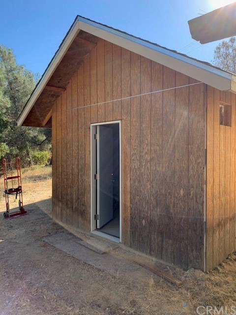 4919 Usona Road Mariposa, CA 95338 - Photo 22 of 38 One of two insulated storage sheds.
