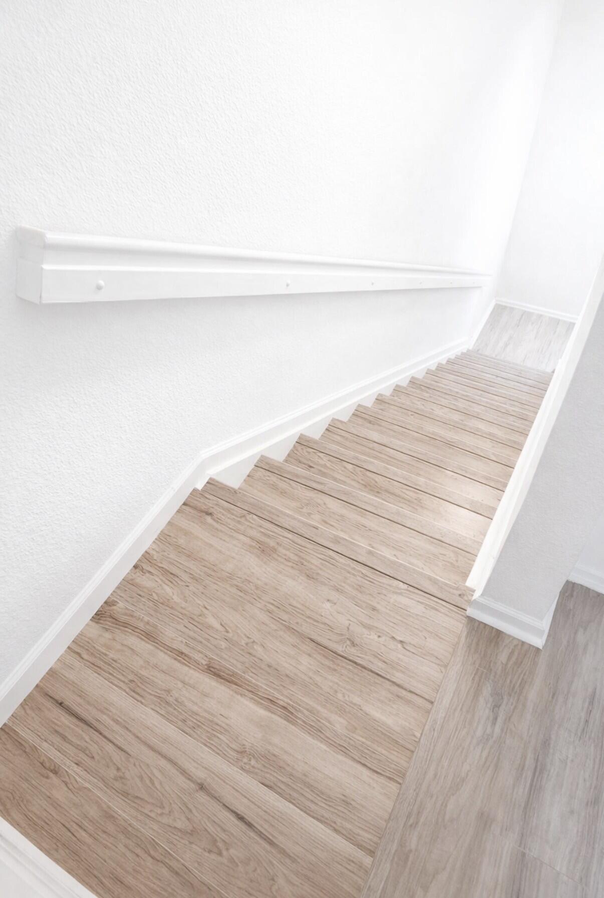 197 Southwest 6th Place, Unit 197 Pompano Beach, FL 33060 - Photo 17 of 24 197 Staircase Down