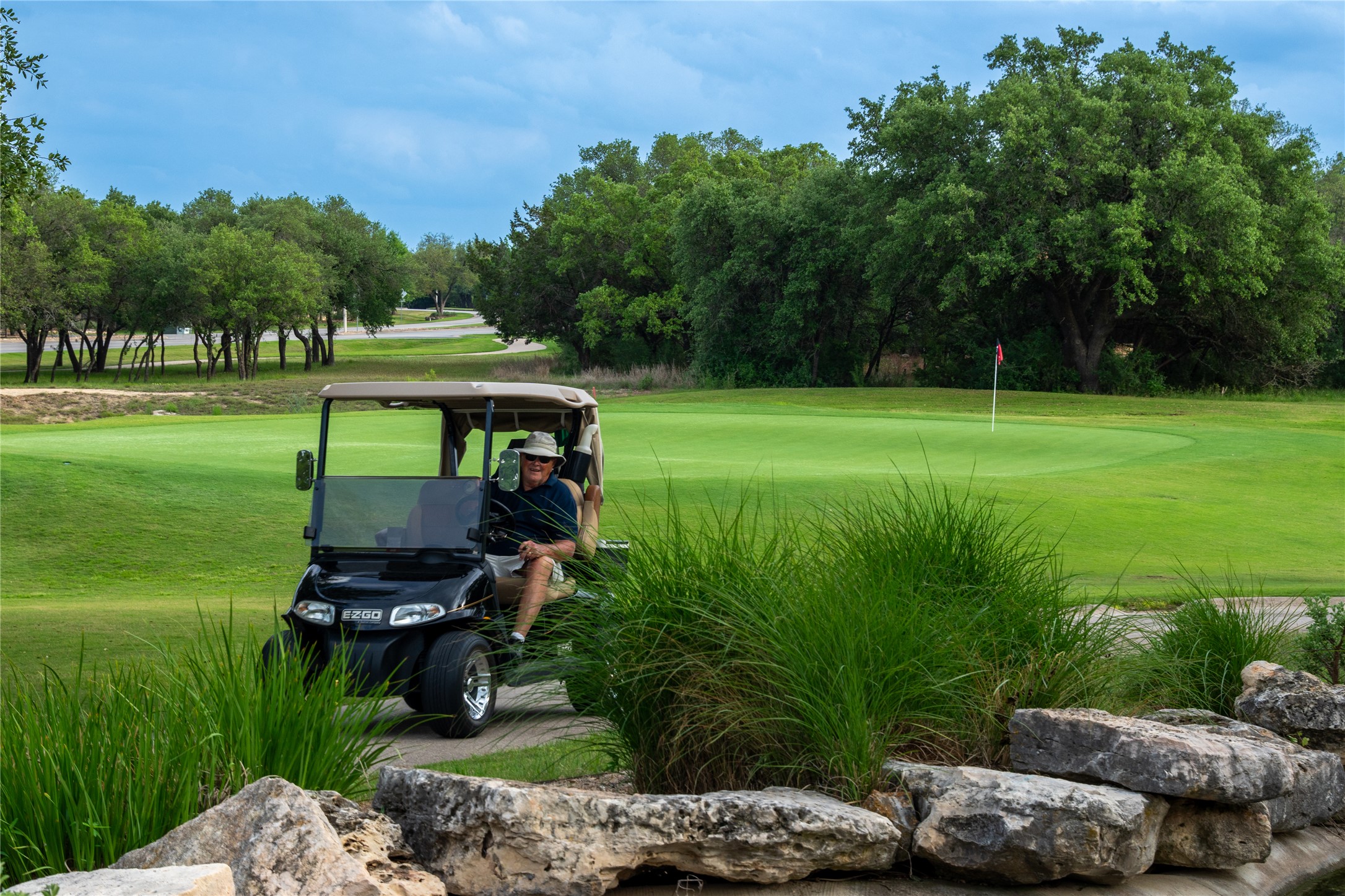 214 Summit Street Georgetown, TX 78633 - Photo 37 of 38 The community offers a golf course with lush green fairways and mature trees