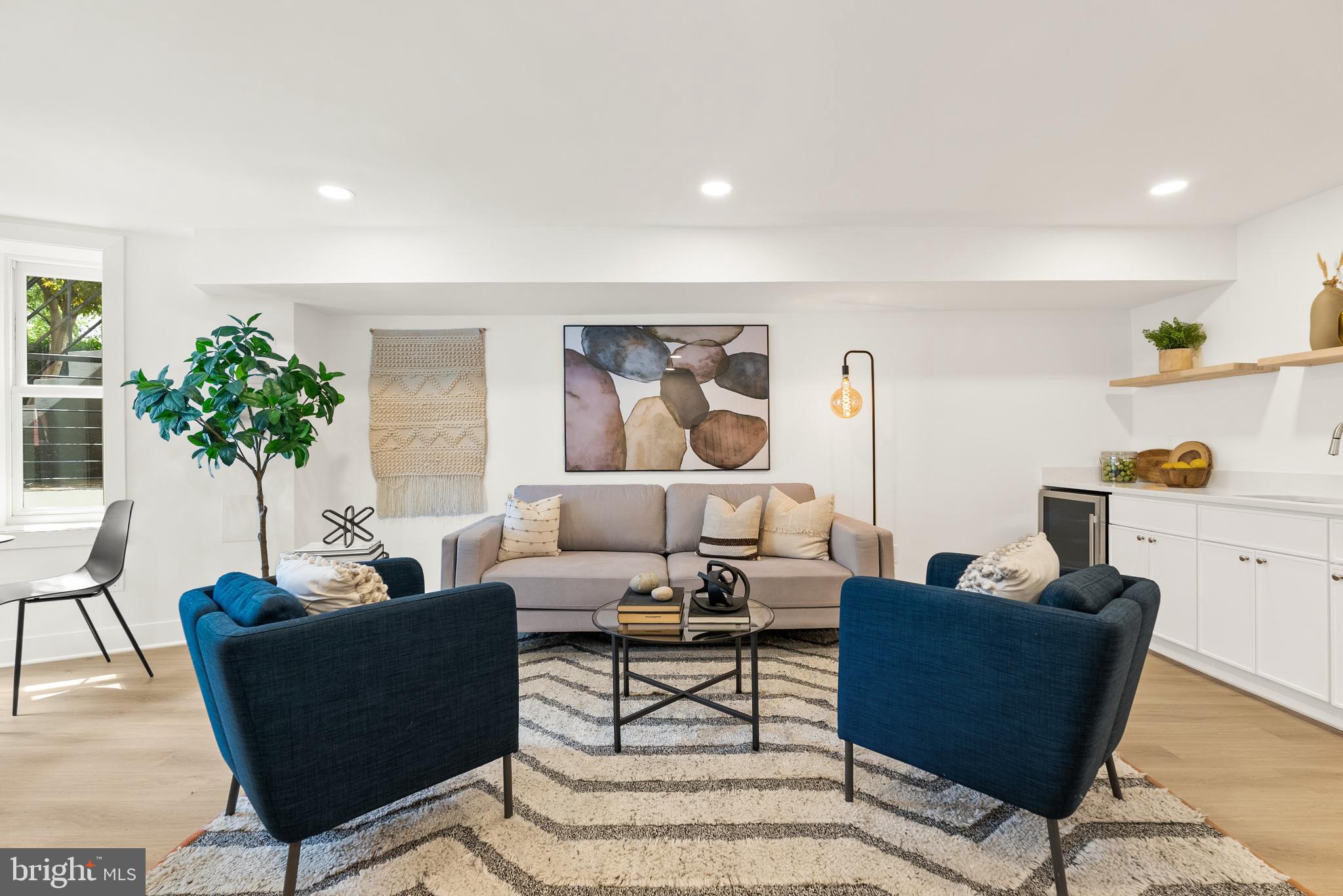 1932 11th Street Northwest Washington, DC 20001 - Photo 16 of 22 a living room with furniture and a potted plant