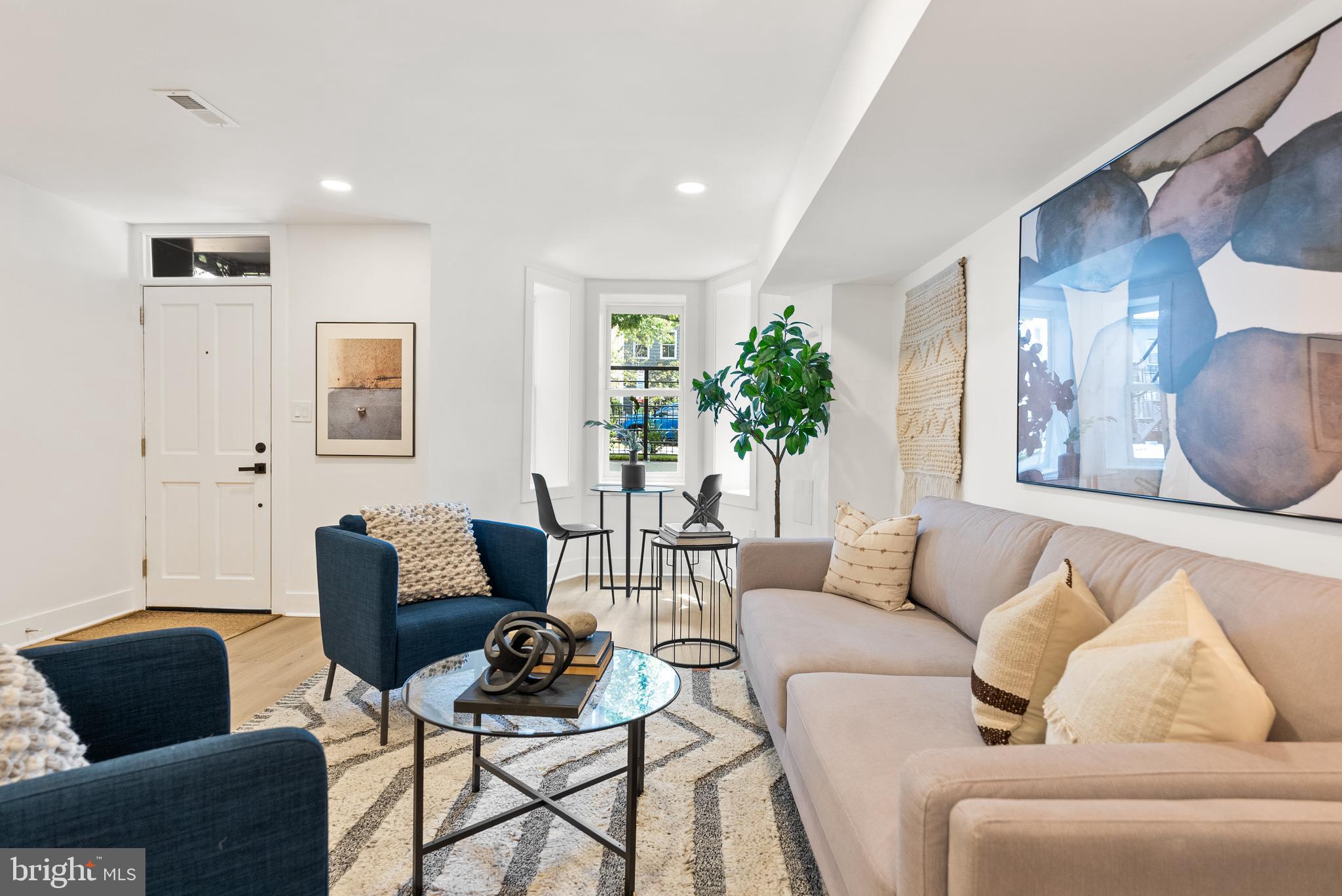 1932 11th Street Northwest Washington, DC 20001 - Photo 17 of 22 a living room with furniture and a potted plant