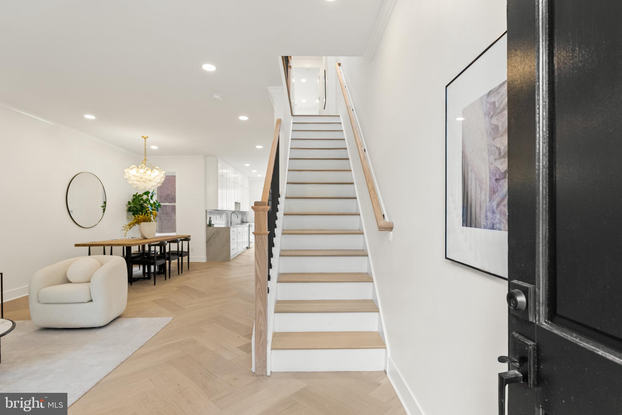 1932 11th Street Northwest Washington, DC 20001 - Photo 3 of 22 a living room with furniture flowerpot and white walls
