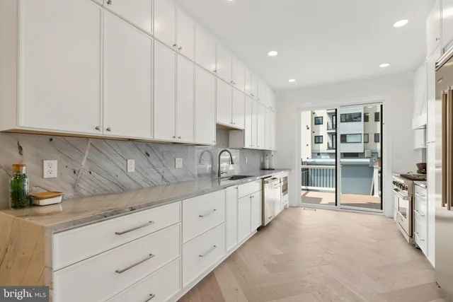 a large kitchen with cabinets