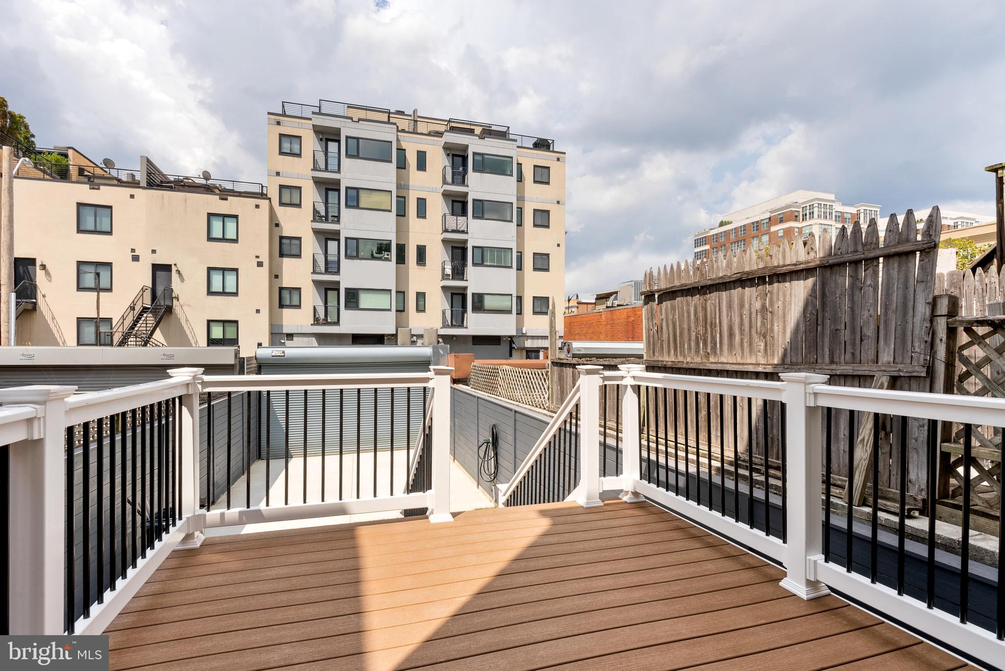 1932 11th Street Northwest Washington, DC 20001 - Photo 8 of 22 a view of balcony with wooden floor