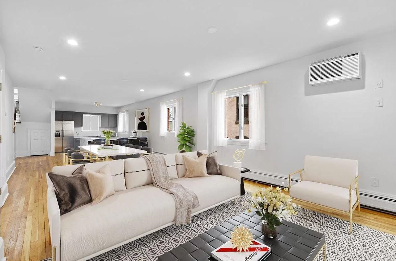 a living room with furniture and a couch