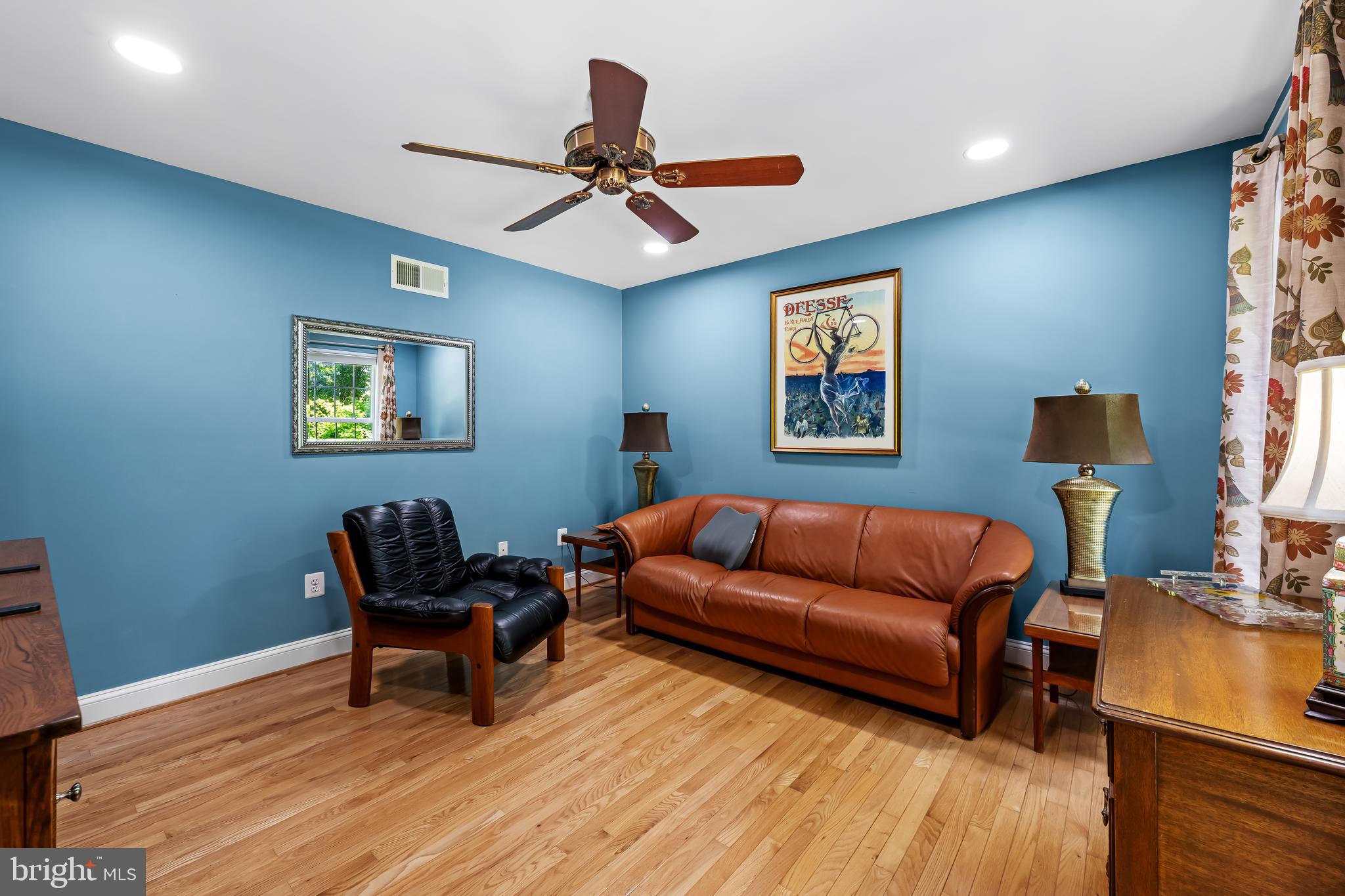 5026 Mt Carmel Road Hampstead, MD 21074 - Photo 7 of 57 a living room with furniture and a wooden floor