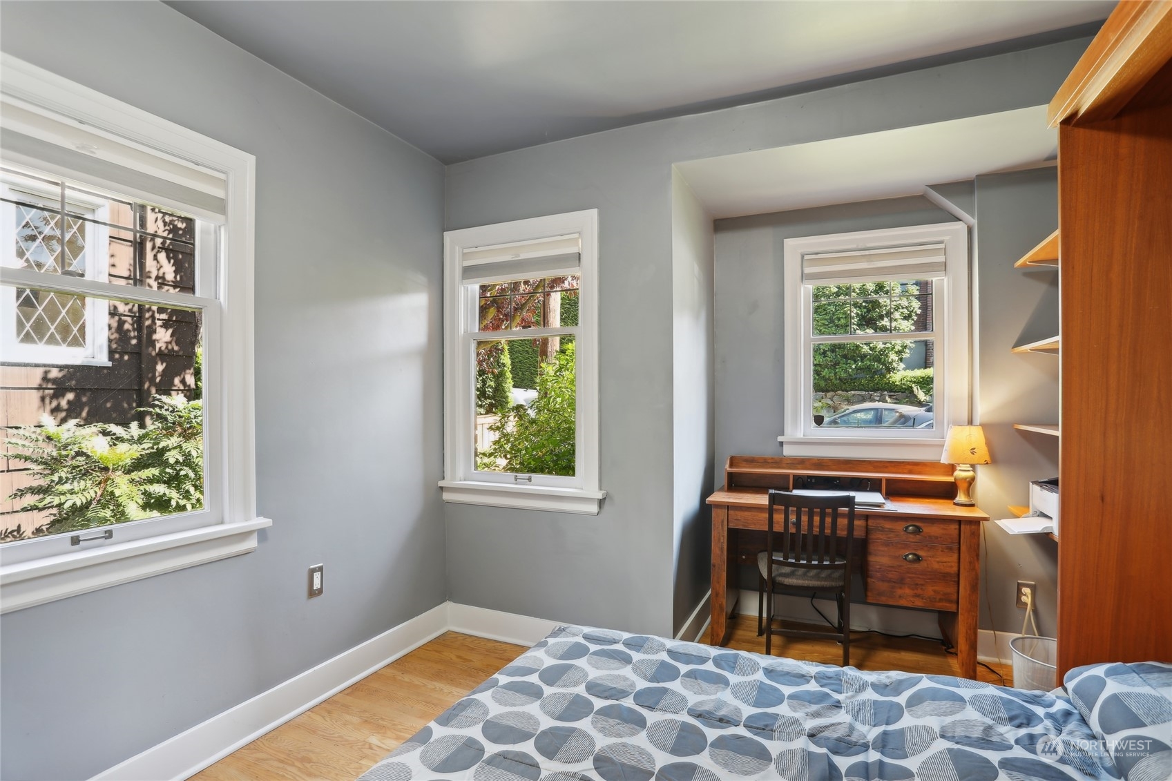 314 Halladay Street Seattle, WA 98109 - Photo 12 of 37 a bedroom with a bed and a window