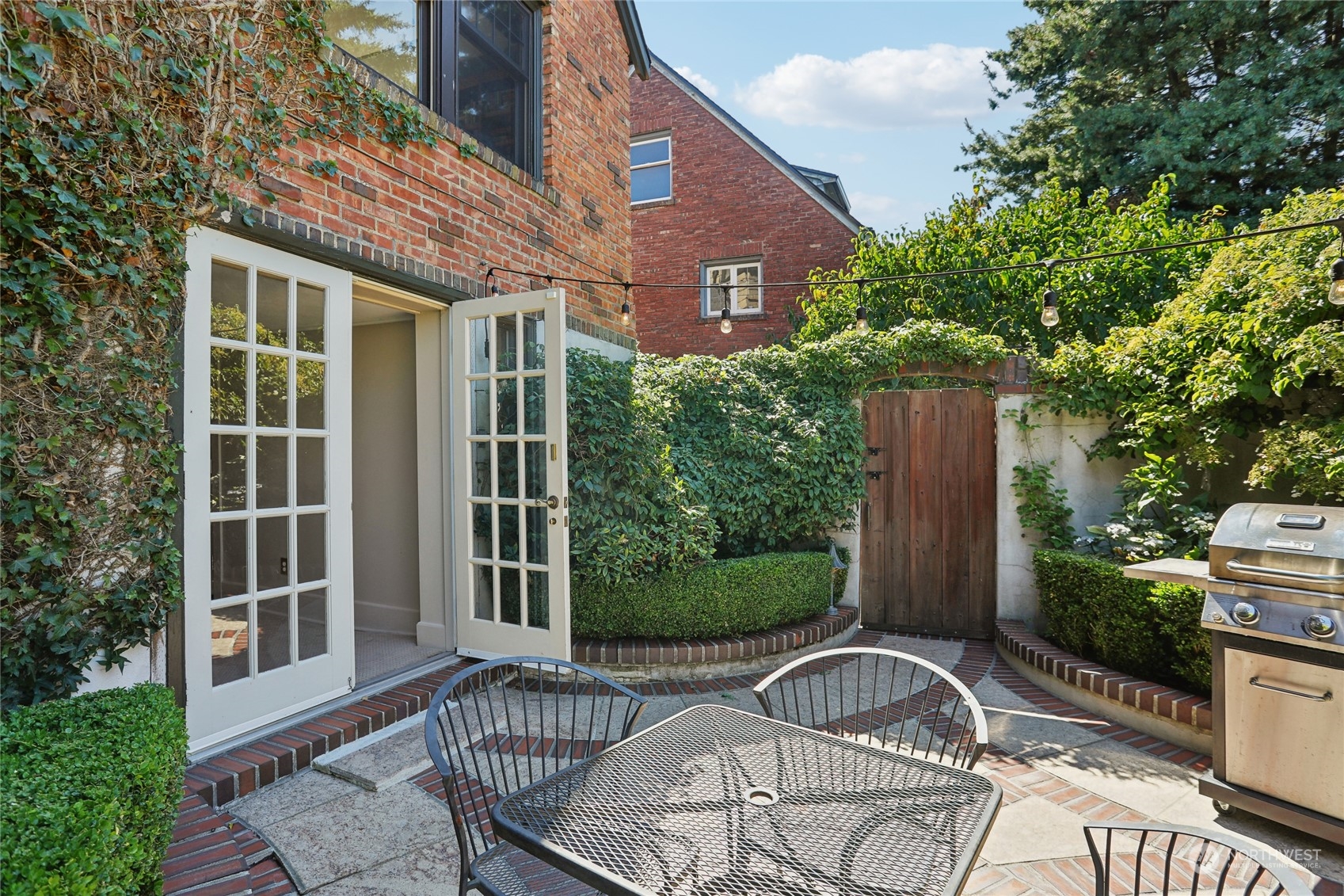 314 Halladay Street Seattle, WA 98109 - Photo 27 of 37 a view of a house with backyard and sitting area