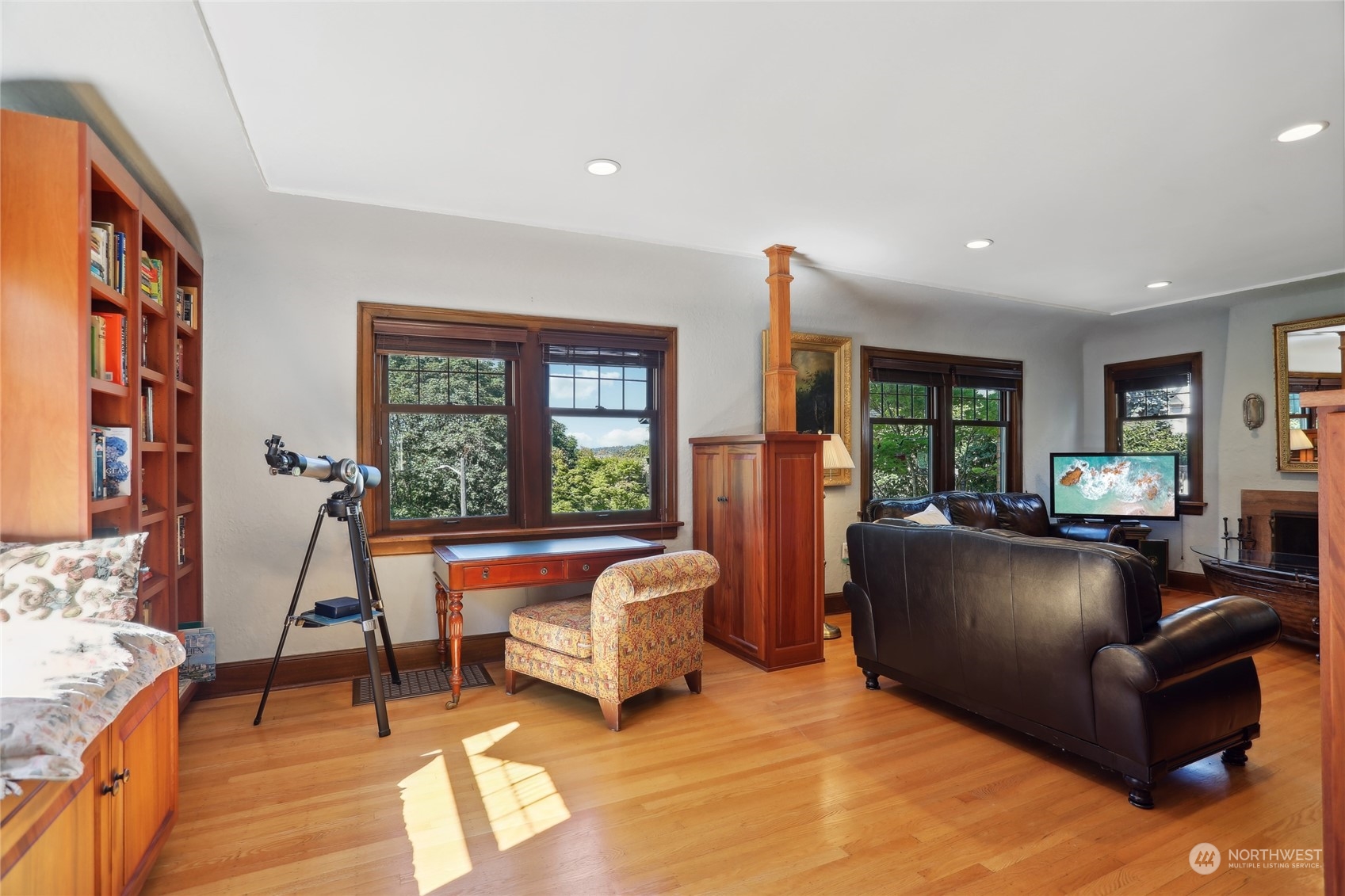 314 Halladay Street Seattle, WA 98109 - Photo 6 of 37 a living room with fireplace furniture and a large window