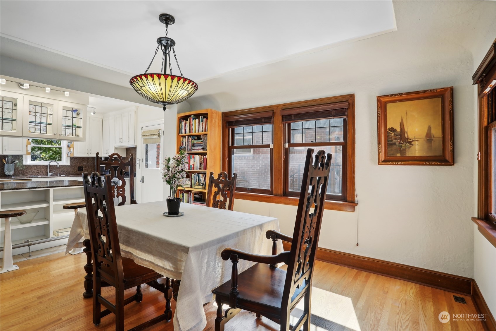 314 Halladay Street Seattle, WA 98109 - Photo 9 of 37 a view of a dining room with furniture window and wooden floor