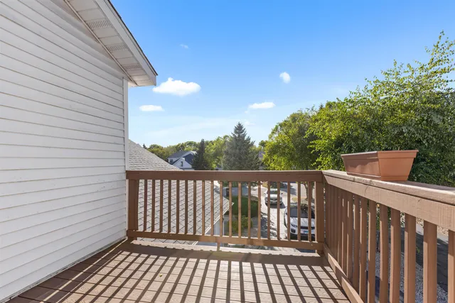 a view of deck with wooden floor and outdoor seating